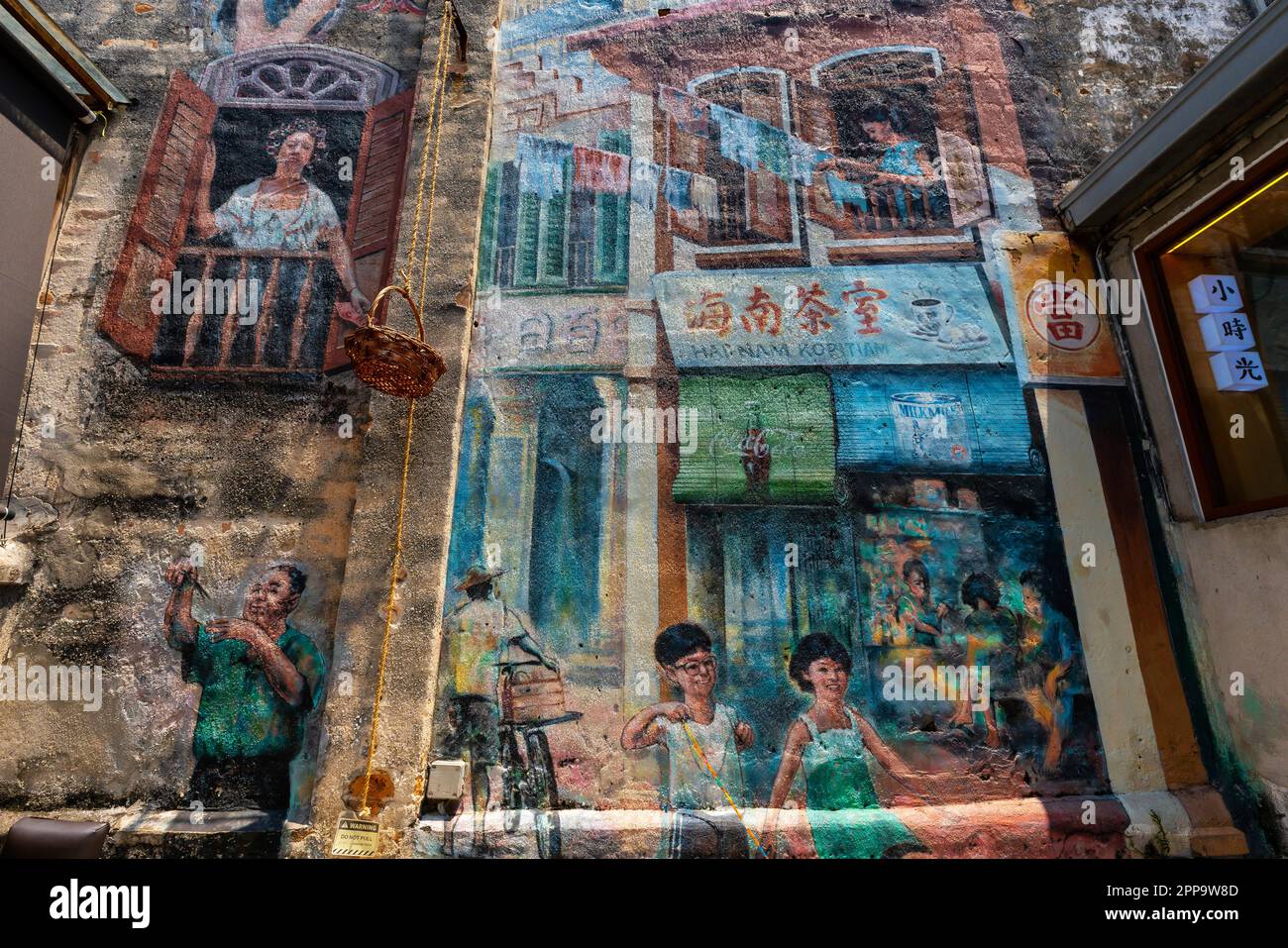 Wunderschöne malaysische Wandbilder von Kuala Lumpur, die das Leben der ersten chinesischen Siedler, Kuala Lumpur Altstadt, Malaysia darstellen. Stockfoto