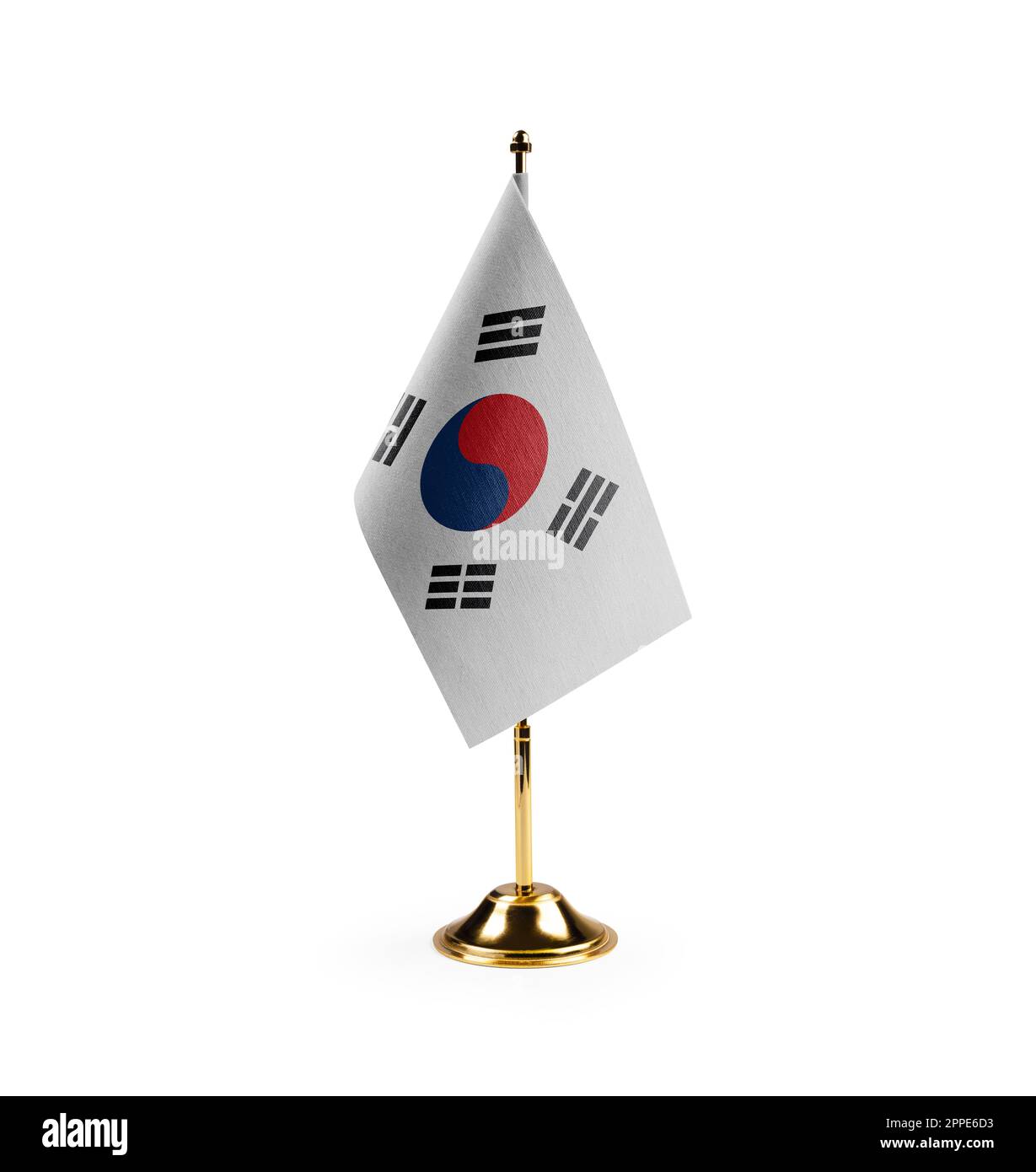 Kleine südkoreanische Nationalflagge auf weißem Hintergrund. Stockfoto