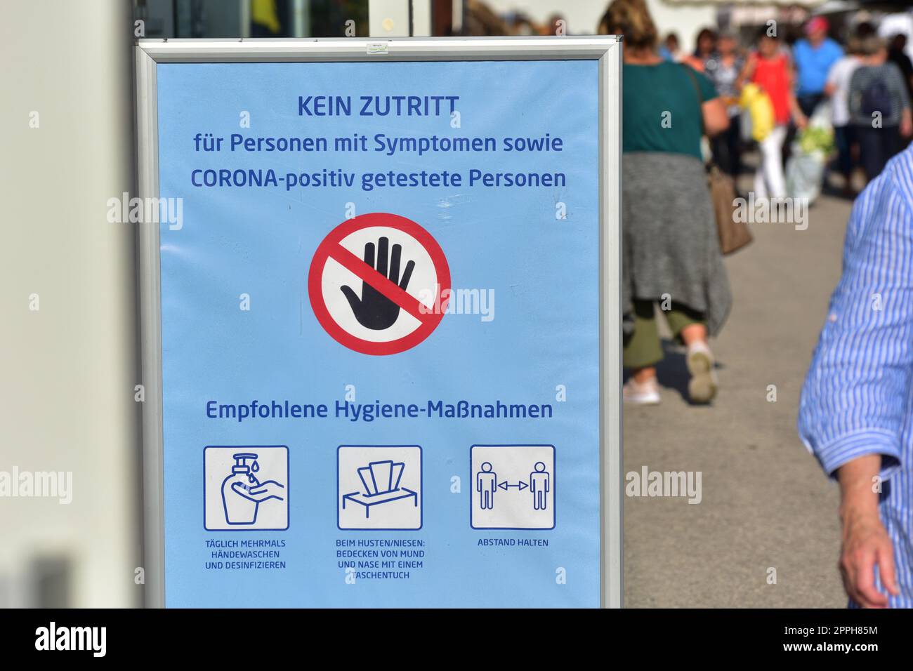 Corona herrscht bei einer Veranstaltung Stockfoto