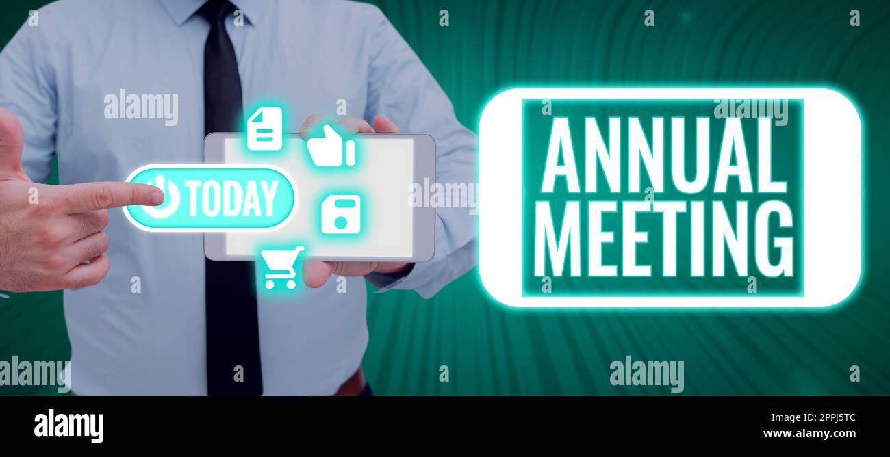 Text mit Inspiration Annual Meeting. Internetkonzept jährliche Zusammenkunft einer Organisation interessierter Aktionäre Stockfoto