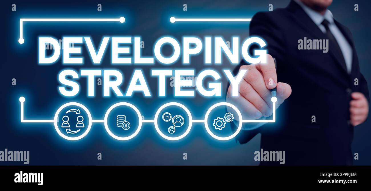 Konzeptioneller Titel „Developing Strategy“. Unternehmen mit Geschäftskonzeptionen verarbeiten Änderungen, um Ziele zu erreichen Stockfoto