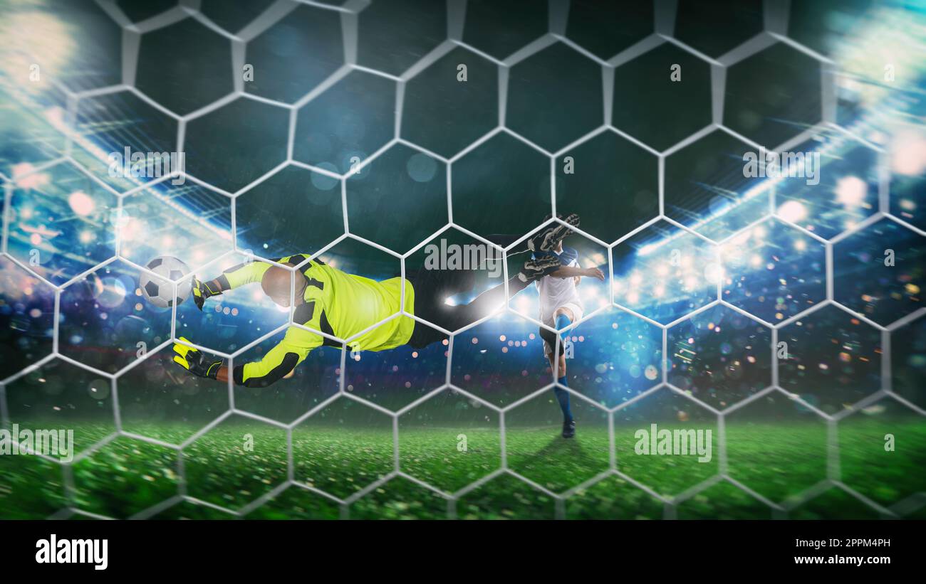 Torwart fängt den Ball im Stadion während eines Fußballspiels Stockfoto