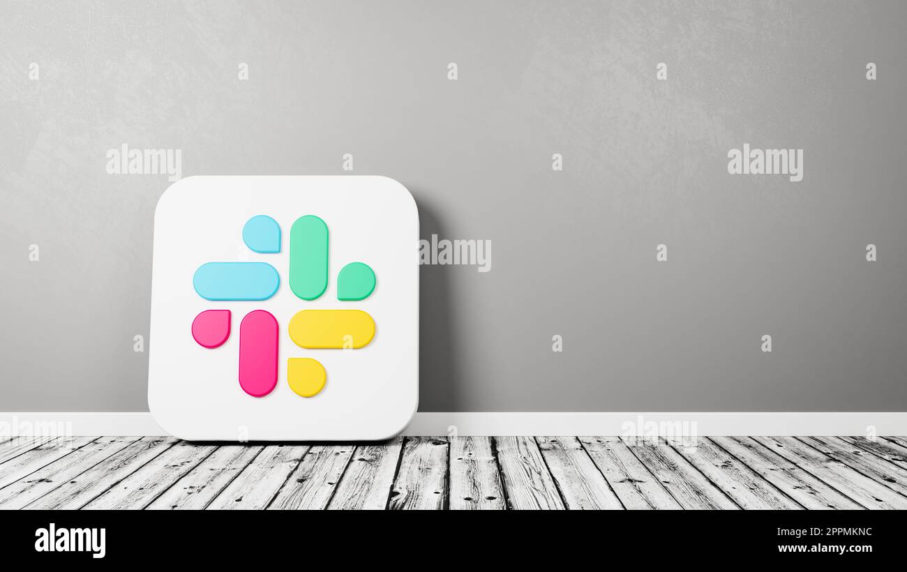 Slack App-Symbol auf Holzboden an der Wand Stockfoto