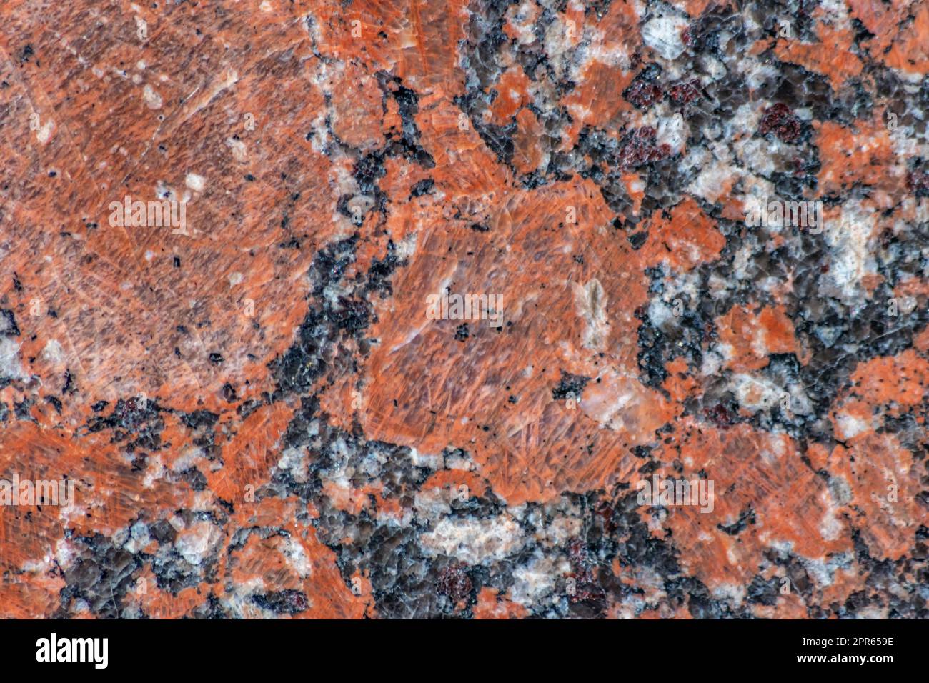 Eleganter roter Marmor und schwarze Marmorstruktur mit elegantem Fußboden mit Marmorfliesen und solidem Gesteinsmaterial als wunderschönes Innenarchitektur- und Fassadendesign-Element mit natürlichen mineralischen Texturen Stockfoto