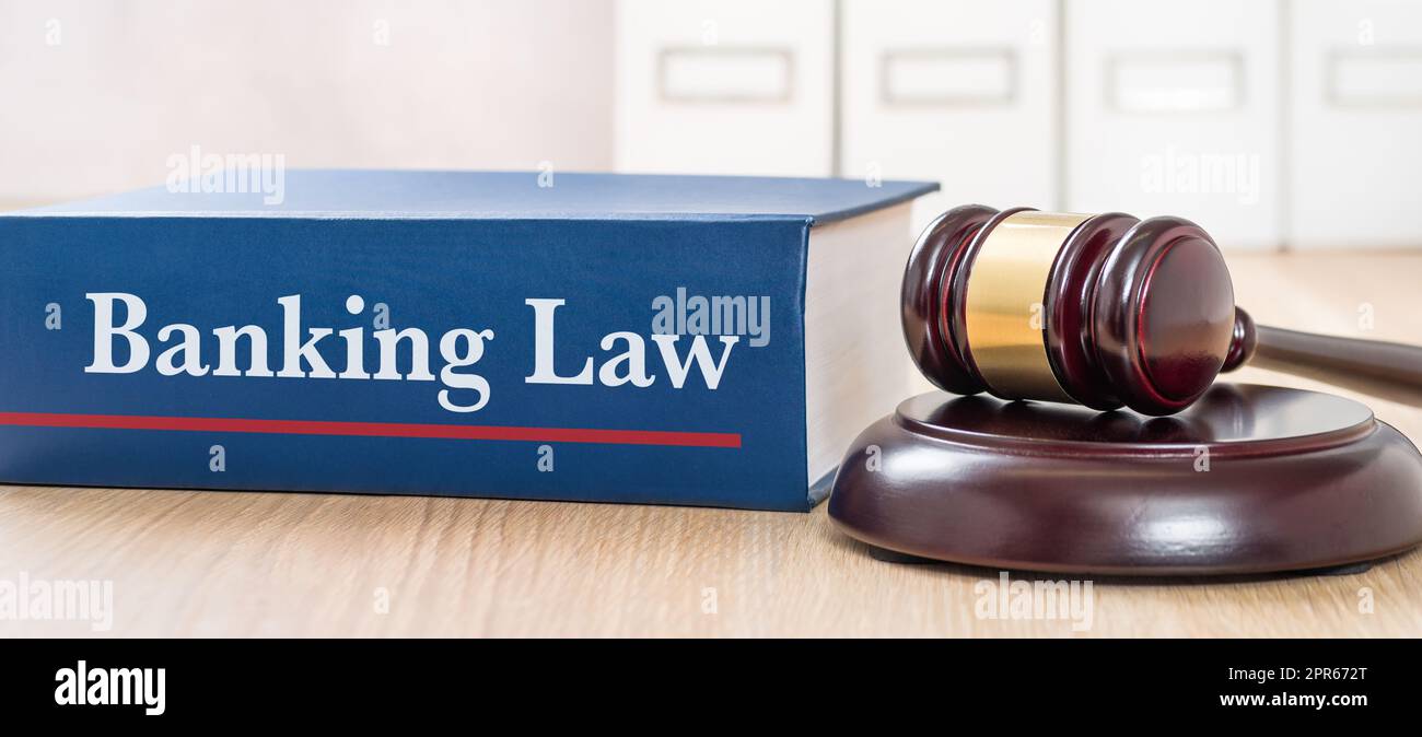 Ein Gesetzbuch mit einem Gavel - Bankrecht Stockfoto