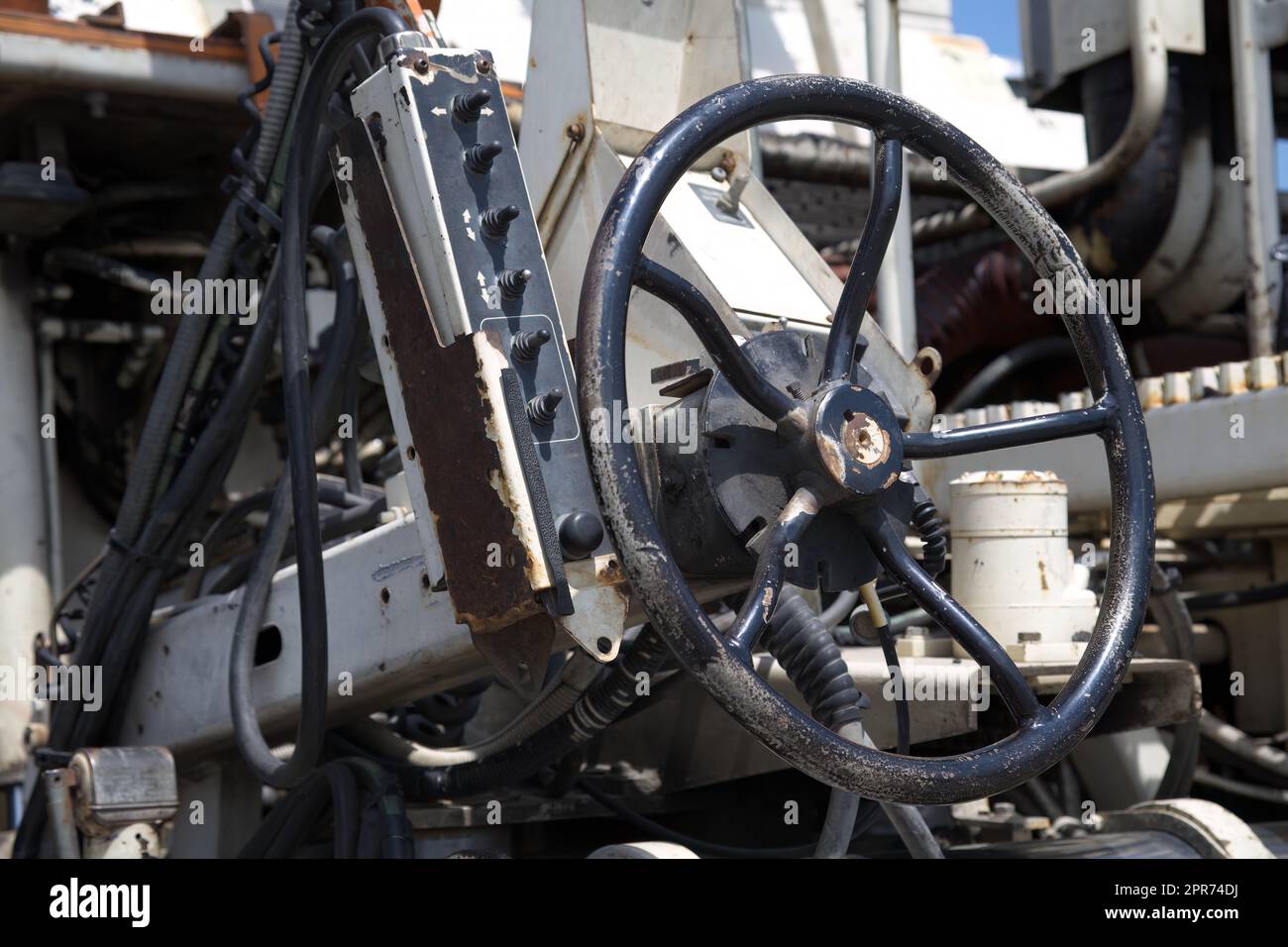 Straßeninstandhaltung Asphaltmaschine Straßenbau Schwermaschinen Lenkung Details Asphaltindustrie Stockfoto