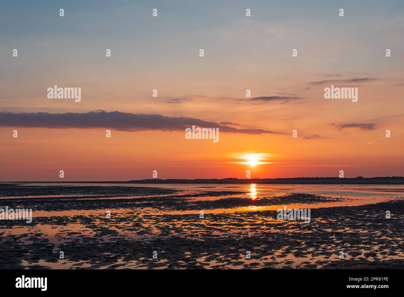 Matsch mit Sonnenaufgang auf der Insel Amrum, Deutschland Stockfoto