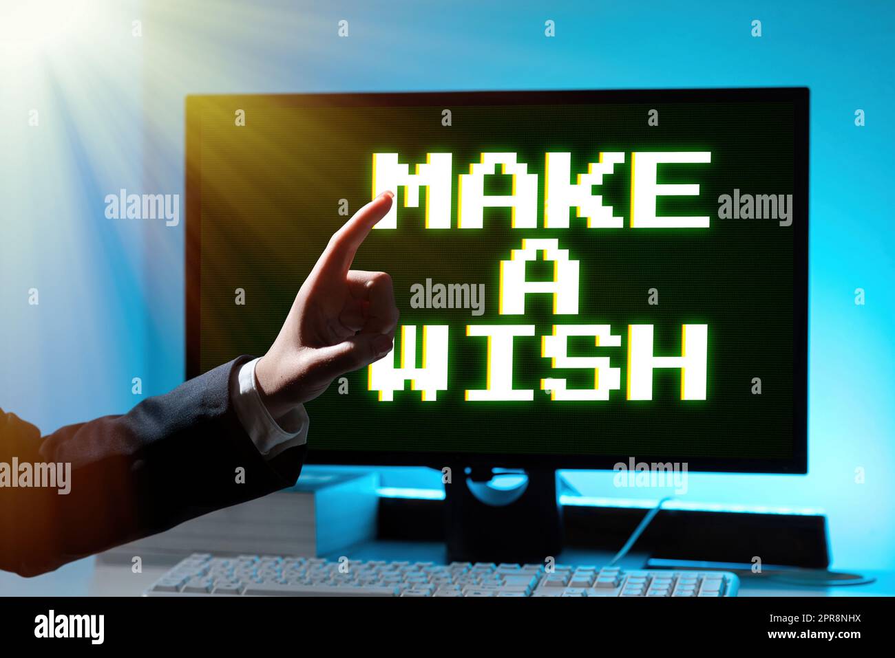 Textzeichen mit „Make A wish“. Geschäftsansatz, um Träume zu haben Wünsche nach zukünftigen Ereignissen seien Sie eine positive Geschäftsfrau, die mit einem Finger auf eine wichtige Botschaft zeigt. Stockfoto