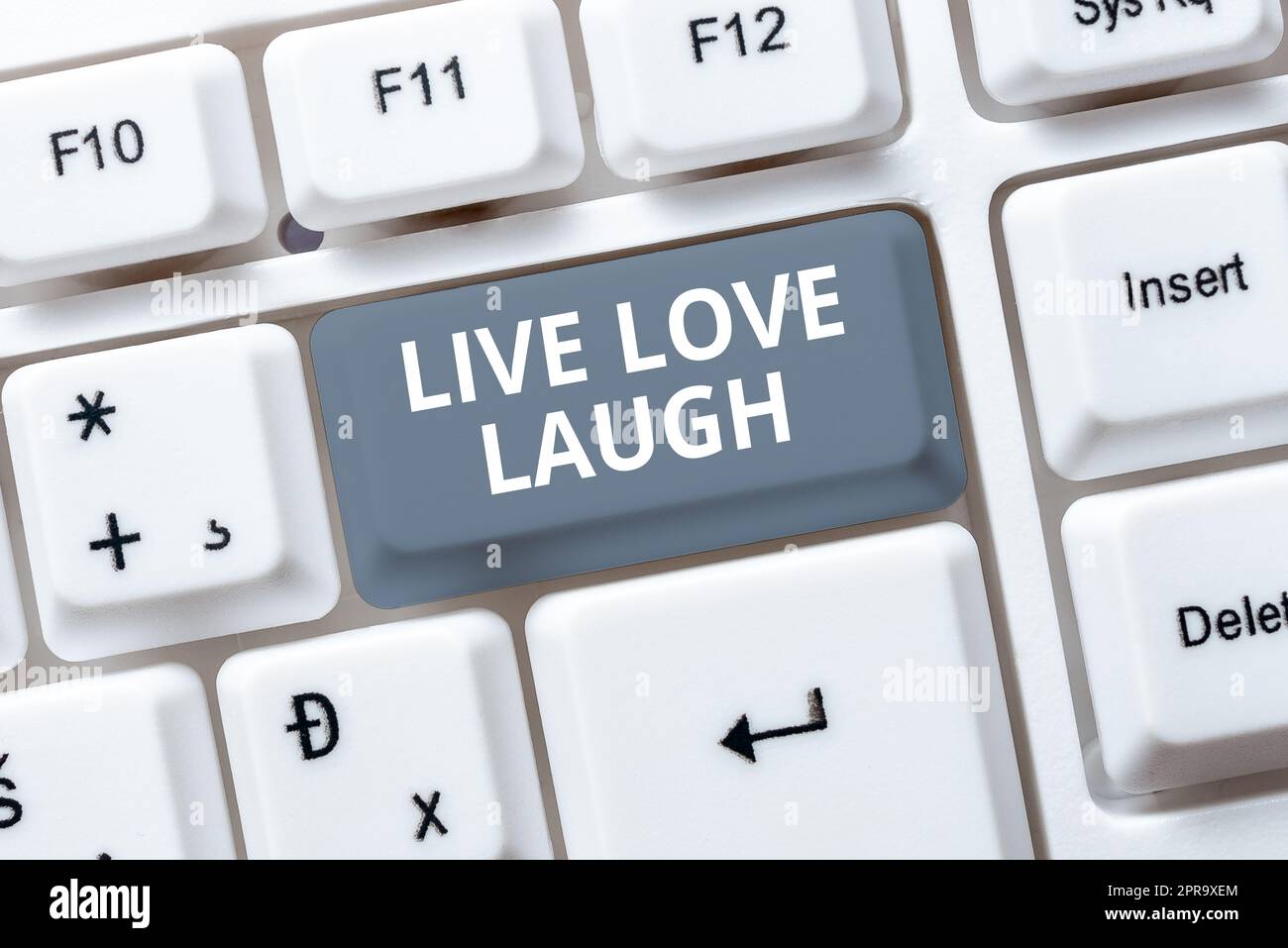 Schild mit Live Love Laugh. Konzeptfoto positiv inspirieren Genießen Sie Ihre Tage Lachen guter Humor -48672 Stockfoto