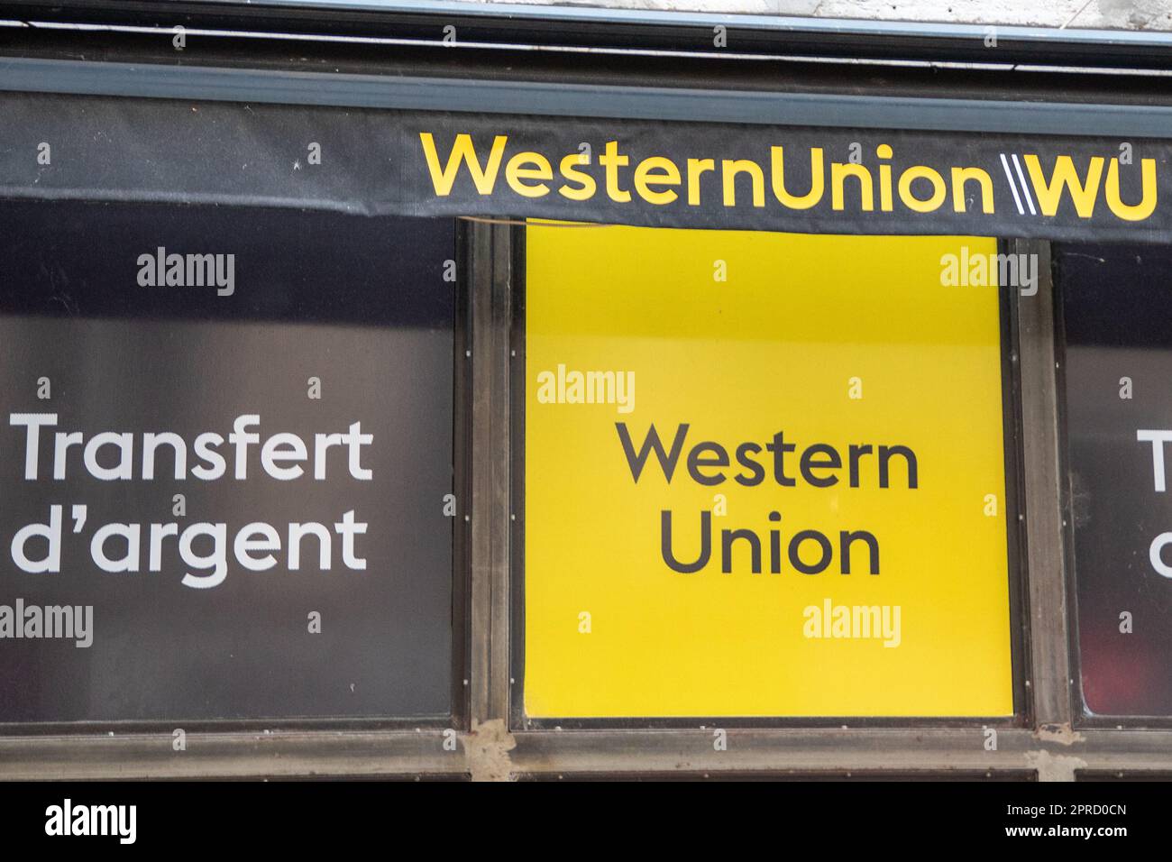 lyon , Aura France - 04 24 2023 : Western Union Signatext und Markenlogo wu-Kettenfassade-Unternehmen american Financial Services Stockfoto