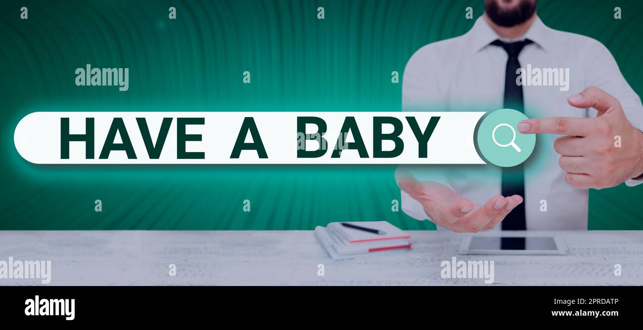 Handschrift Schild "Baby haben". Geschäftsratschläge, um schwanger zu werden und ein Kind zu haben Empfehlung Mann hält Ein Tablet projiziert Eine Kamera und zeigt kreative Fotografie. Stockfoto