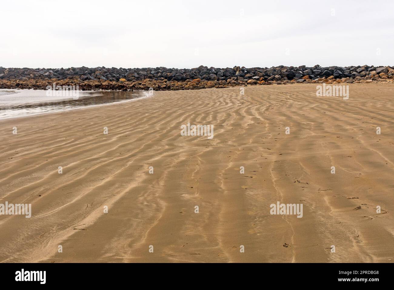 Wellenmuster im Sand Stockfoto