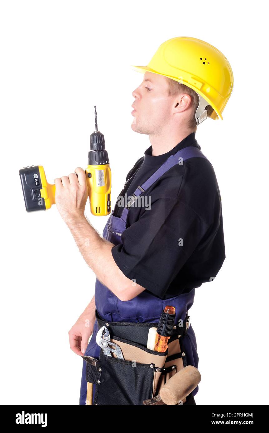 Porträt eines jungen Handwerkers, Arbeiter, Monteur vor weißem Hintergrund Stockfoto