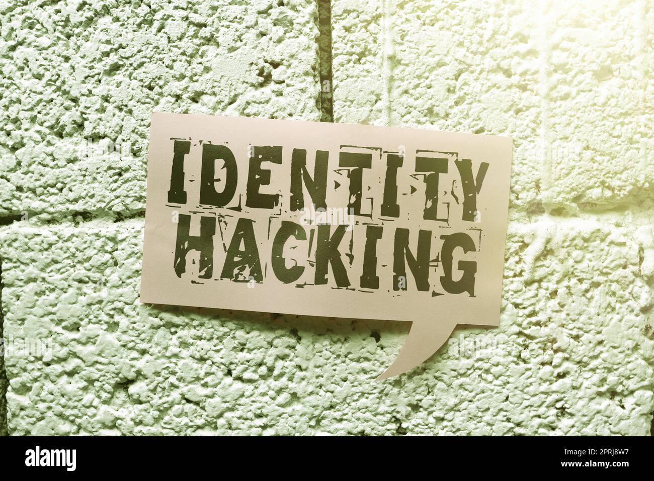 Handschriftlicher Text Identität Hackingkrimineller, der Ihre persönlichen Daten mit Malware stiehlt. Ein Wort für Kriminelle, die Ihre persönlichen Daten mit Malware stehlen Stockfoto
