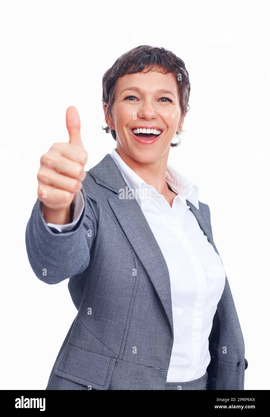 Gut gemacht. Porträt einer lächelnden weiblichen Führungskraft, die Ihnen Glück auf weißem Hintergrund wünscht. Stockfoto
