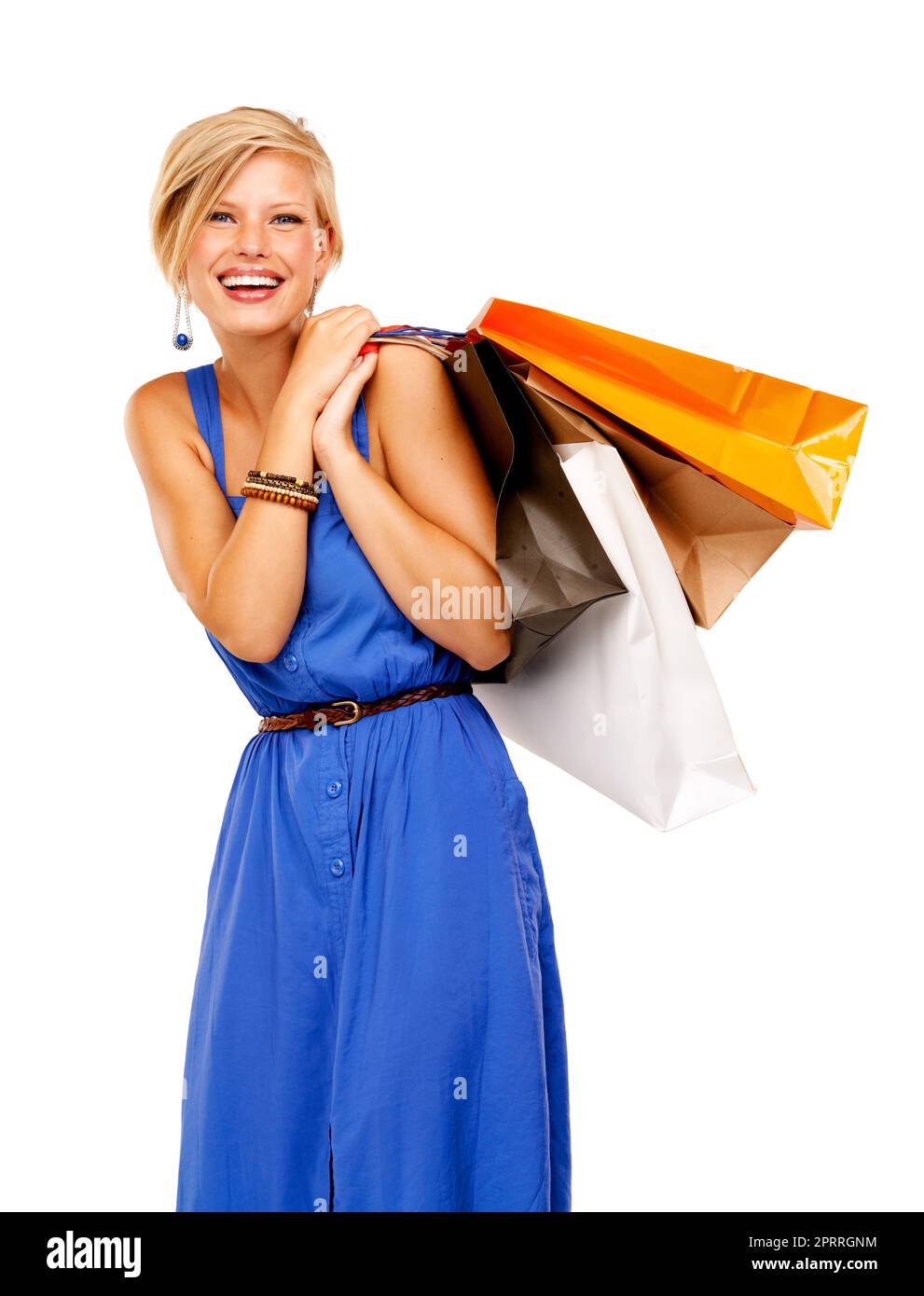 Es gibt so viel Auswahl. Eine attraktive junge Frau mit einem Haufen Einkaufstaschen. Stockfoto