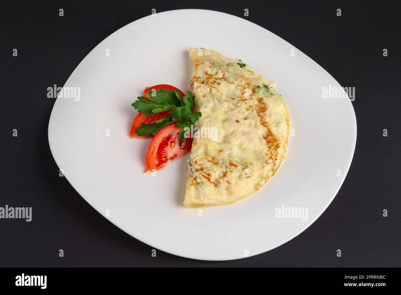 Draufsicht der Omelett mit Schinken und Gemüse Stockfoto