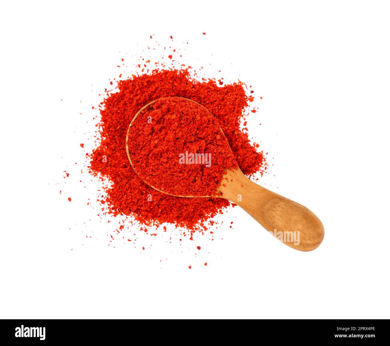 Holzlöffel voll mit roter, heißer Chili-Pfeffer Stockfoto