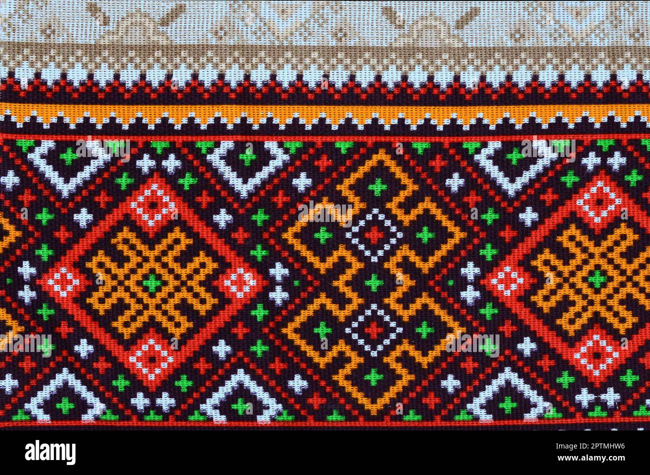 Traditionelle ukrainische Volkskunst aus Gewirken Stickmuster auf Gewebe. Farbige pixel Design aus Segeltuch. Stockfoto