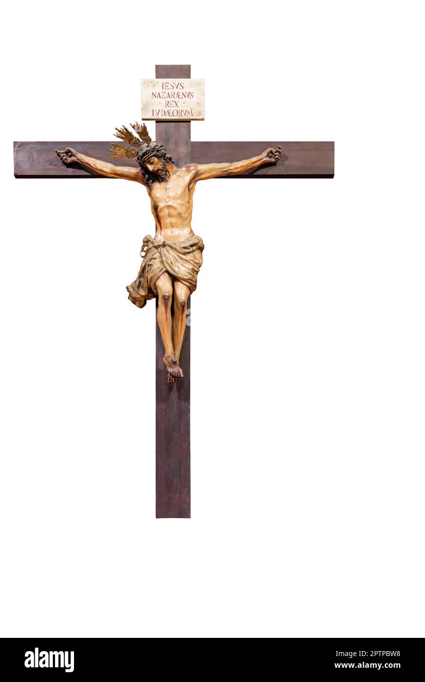 Jesus Christus am Kreuz mit einem lateinischen Schild mit dem Text "IESUS NAZARENUS REX IUDAEORUM", was Jesus von Nazareth, König der Juden, isoliert bedeutet Stockfoto