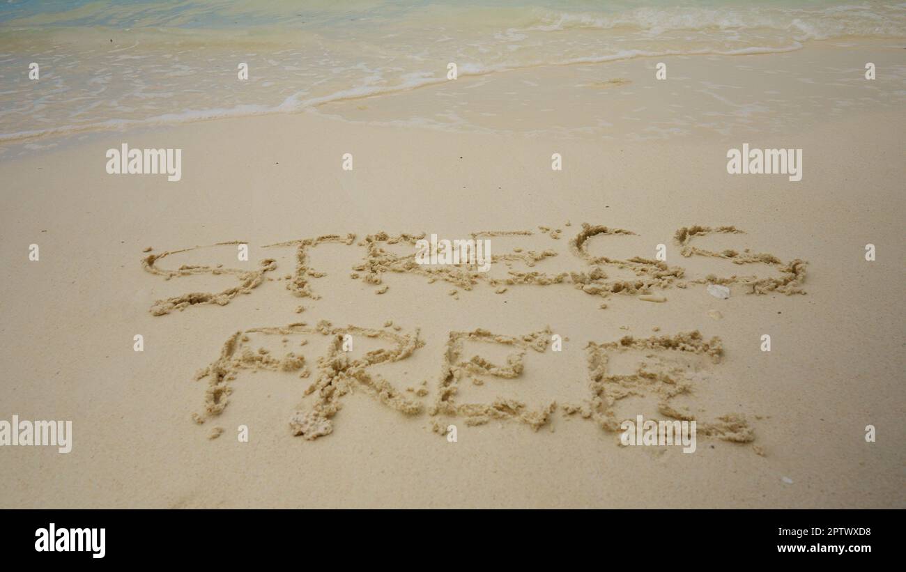 Stressfreie Zone Geschrieben Auf Sand Am Meer Am Strand Stockfoto