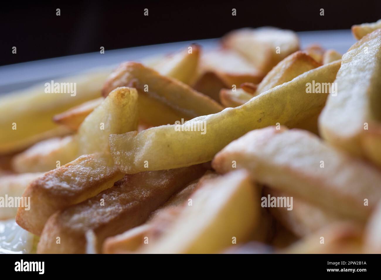Sfondo Creato con patatine fritte, Cibo pro Fast Food Stockfoto