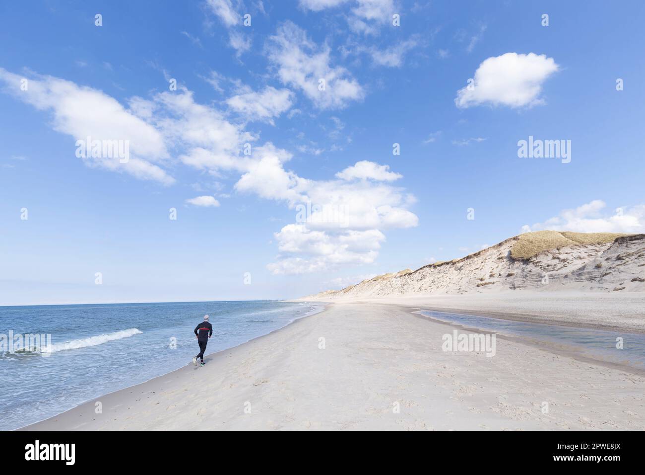 Am Meeresstrand, Dänemark, Nordsee, am Meeresstrand, Dänemark, Nordsee, Joggen, Stockfoto