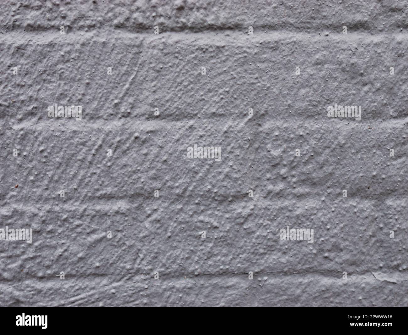 Einfache raue, cremefarbene, strukturierte Backsteinwand für Hintergrundbilder – Fügen Sie Ihren eigenen Text hinzu Stockfoto
