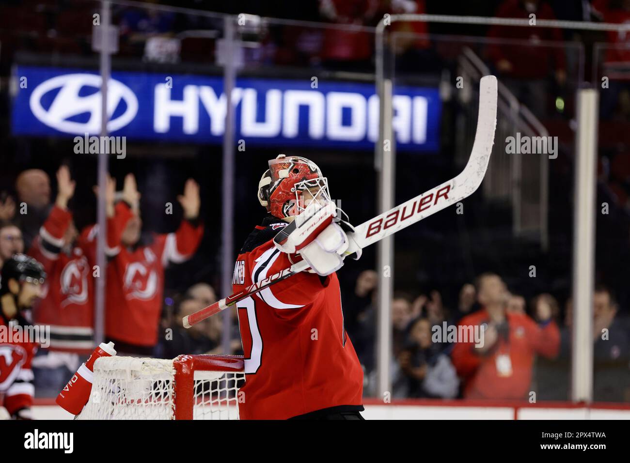 New Jersey Devils goaltender Akira Schmid reacts after the defeating ...