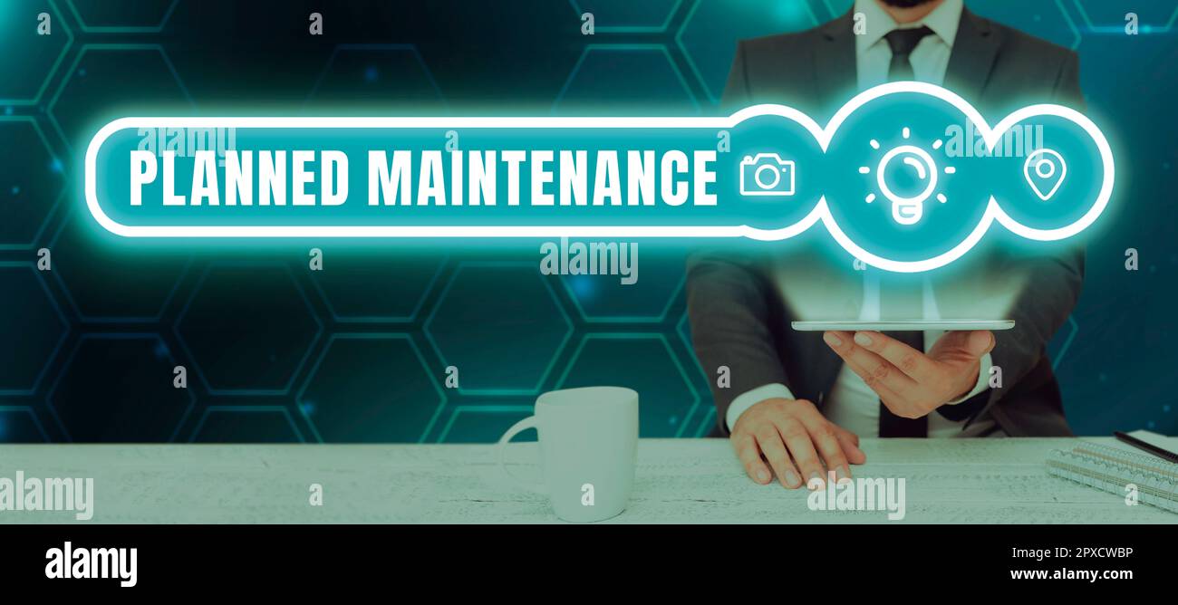 Handschriftlich unterschreiben Sie Planned Maintenance (geplante Wartung), Concept (Konzept) bedeutet, dass regelmäßig Überprüfungen durchgeführt werden müssen Stockfoto