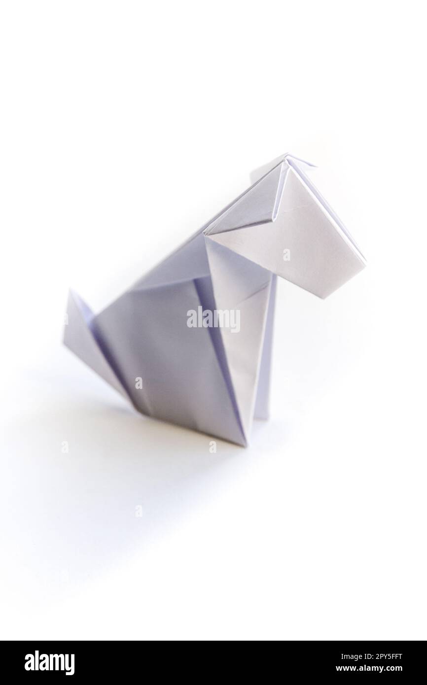 Papier Hund Origami isoliert auf einem weißen Hintergrund Stockfoto