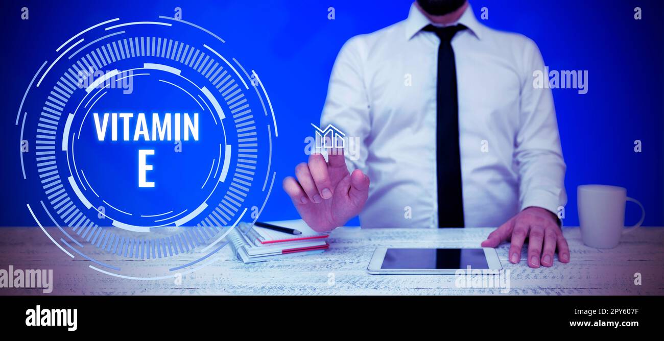 Schild mit Vitamin E. Business Idea Antioxidans schützt Körpergewebe vor Schäden durch Substanzen Stockfoto