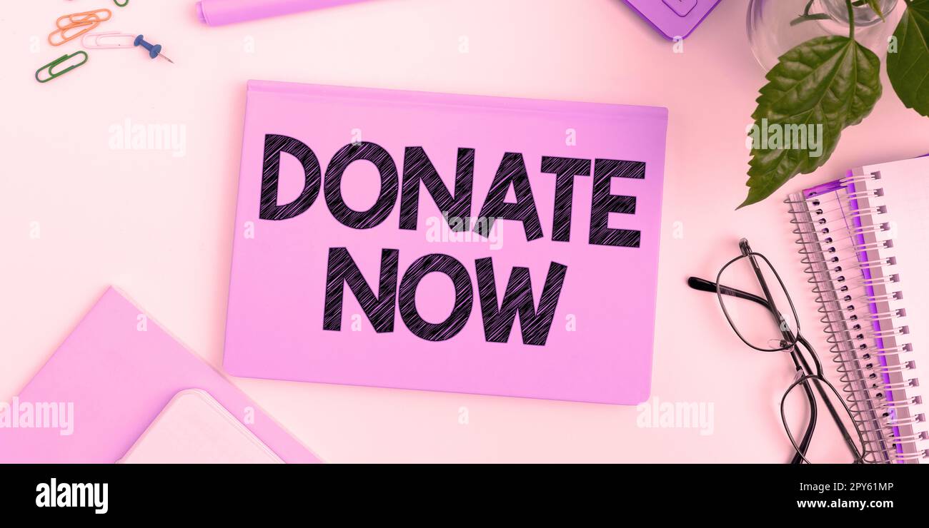 Inspiration mit Schild „Jetzt spenden“. Ein Wort für etwas wie Geld oder Waren für eine Wohltätigkeitsorganisation oder irgendeinen Zweck Stockfoto