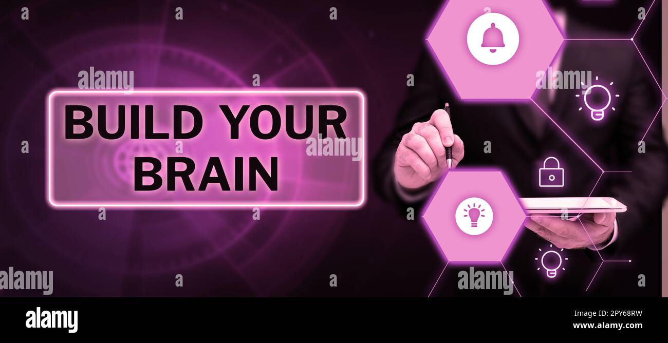 Das Schild zeigt „Baue dein Gehirn“ an. Wort für mentale Aktivitäten, um kognitive Fähigkeiten zu erhalten oder zu verbessern Stockfoto