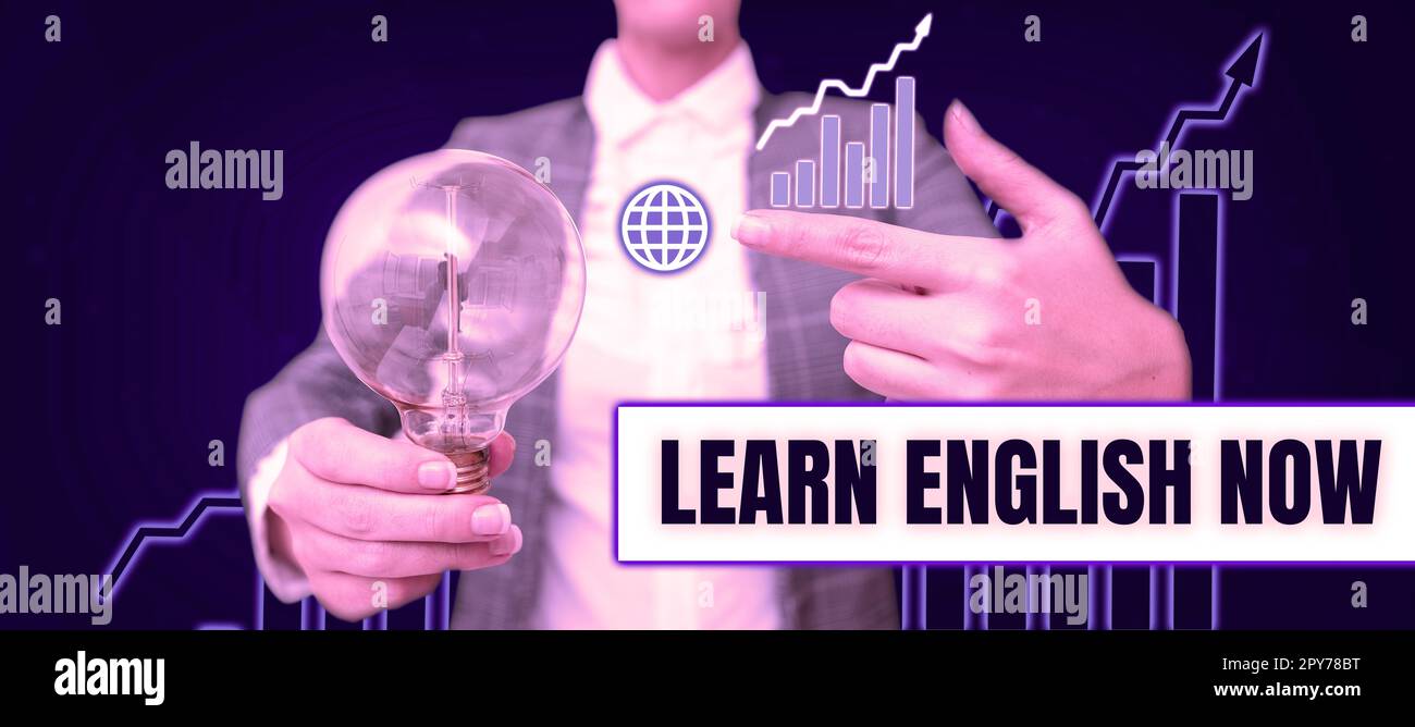 Handschriftlicher Text Jetzt Englisch lernen. Ein Wort, das darauf abzielt, Kenntnisse und Fähigkeiten in englischer Sprache zu erlangen oder zu erwerben Stockfoto