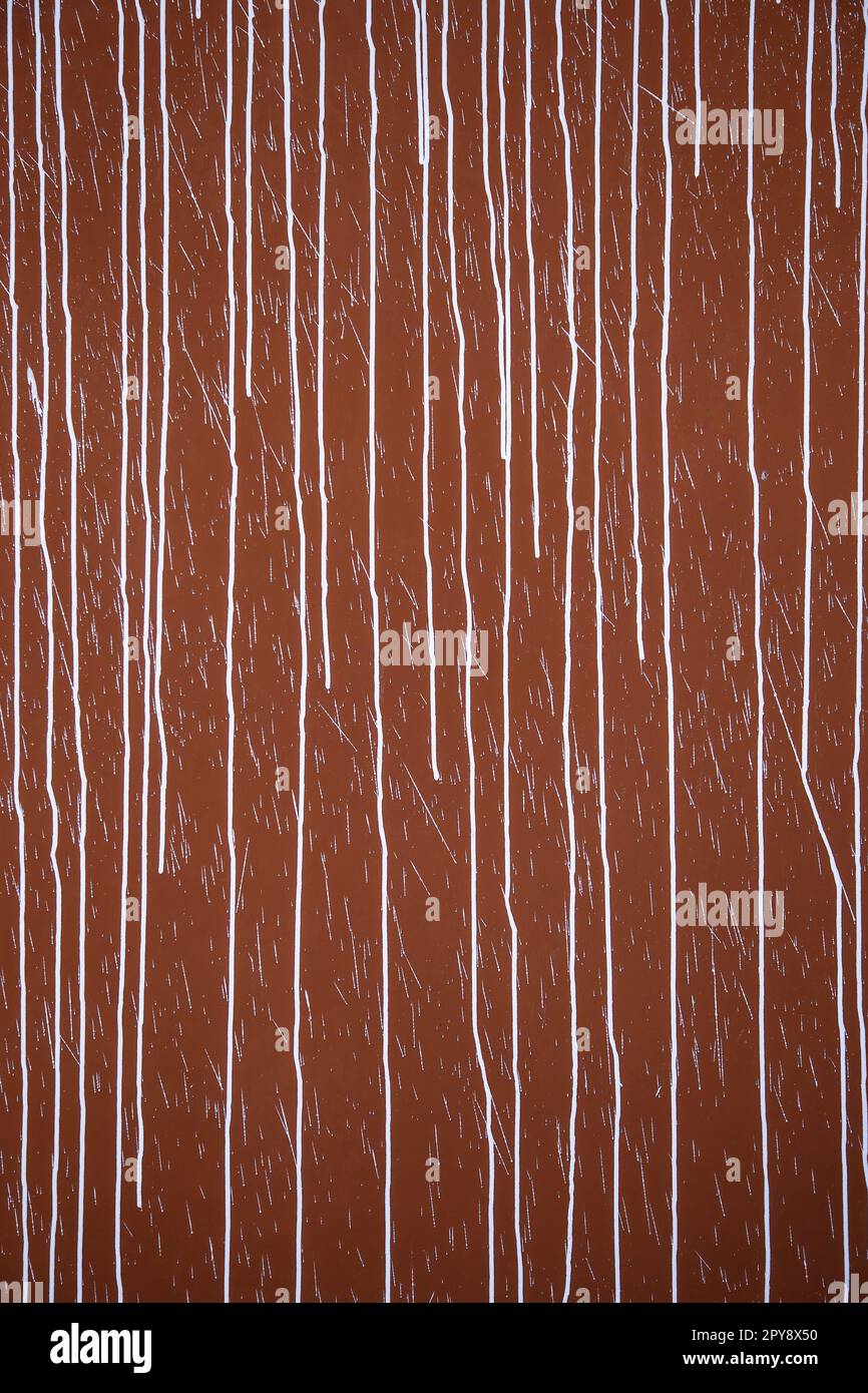 Verspritzte rote Wand Stockfoto