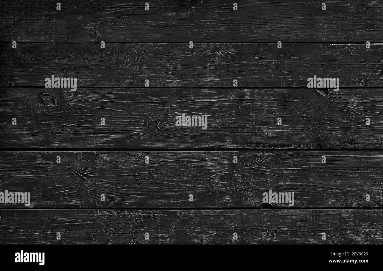Schwarz lackiert Holzbohlen Hintergrund Stockfoto