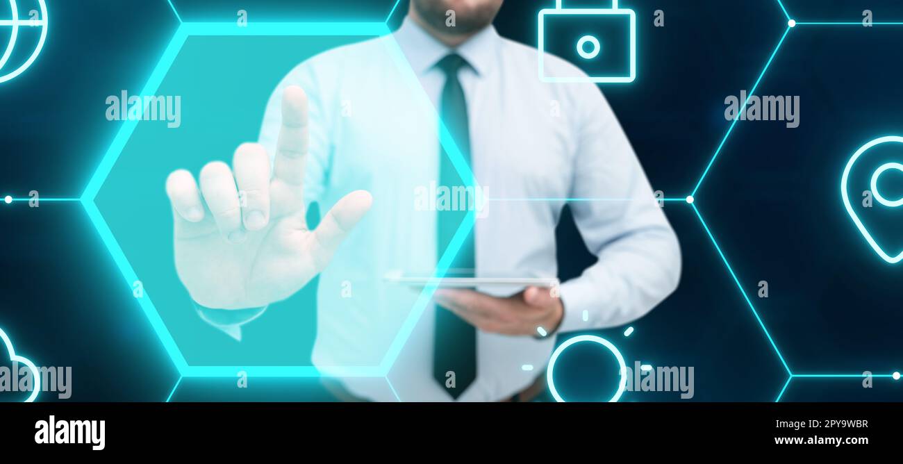 Mann, Der Das Tablet In Der Hand Hält Und Das Sicherheitssystem Mit Dem Finger Berührt. Erwachsener: Digital Touch Business Computer System. Geschäftsmann Im Stehen Stockfoto