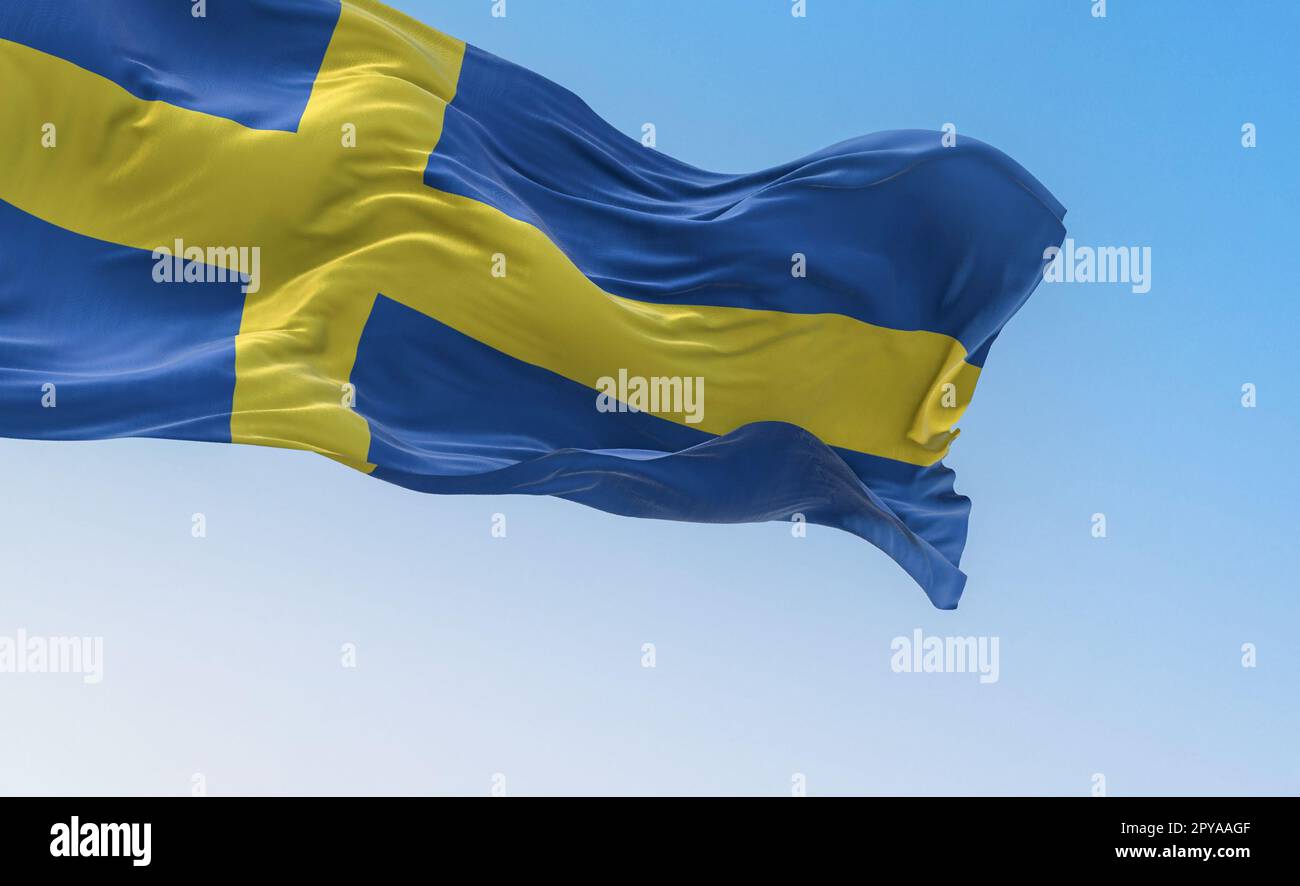 Die schwedische Nationalflagge winkt an einem klaren Tag Stockfoto