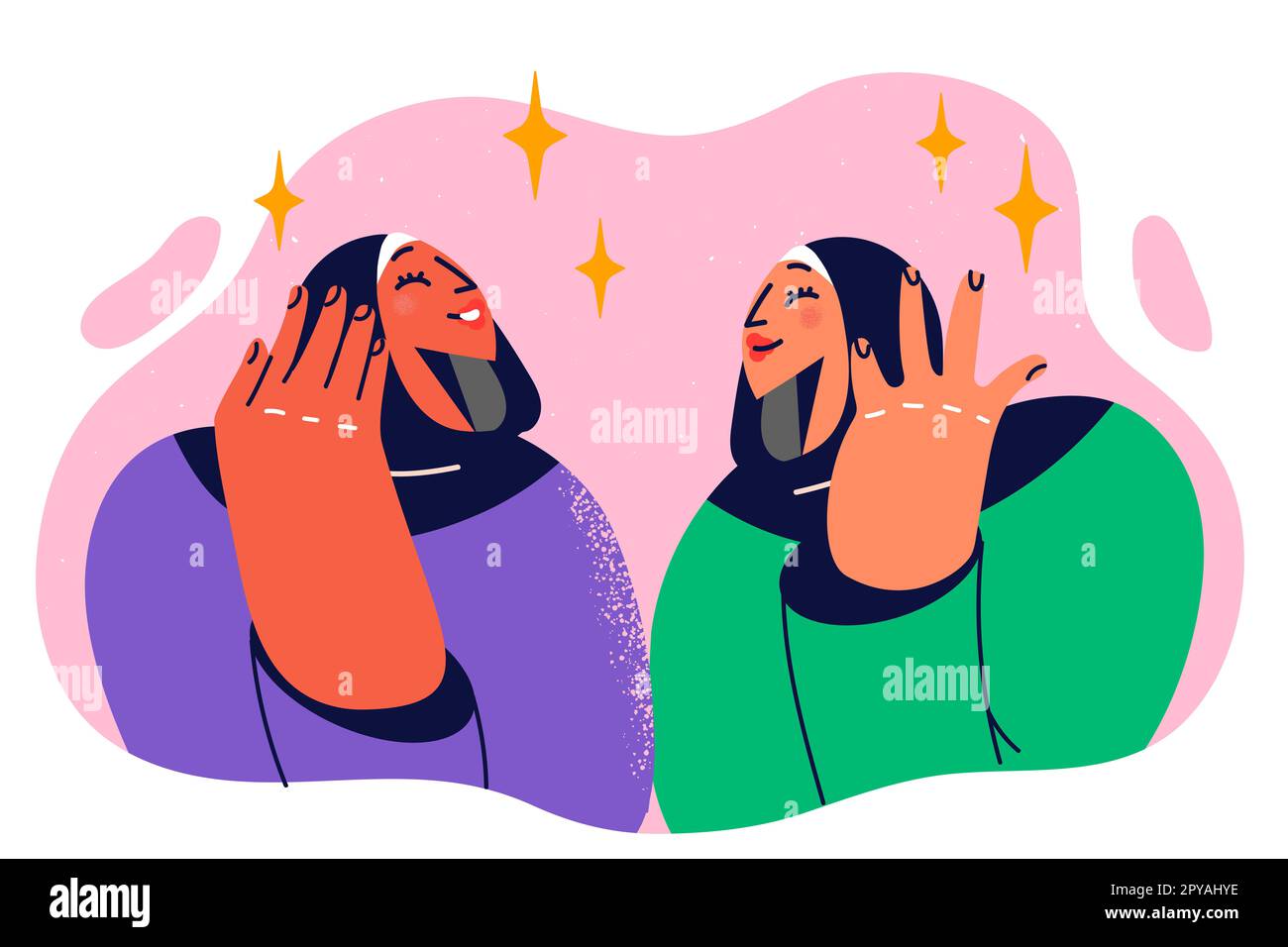 Zwei schöne Frauen in arabischer Kleidung reden über die neuesten Nachrichten und genießen das Leben. Mädchen in muslimischen Kopftüchern lächeln während des dialogs oder Stockfoto