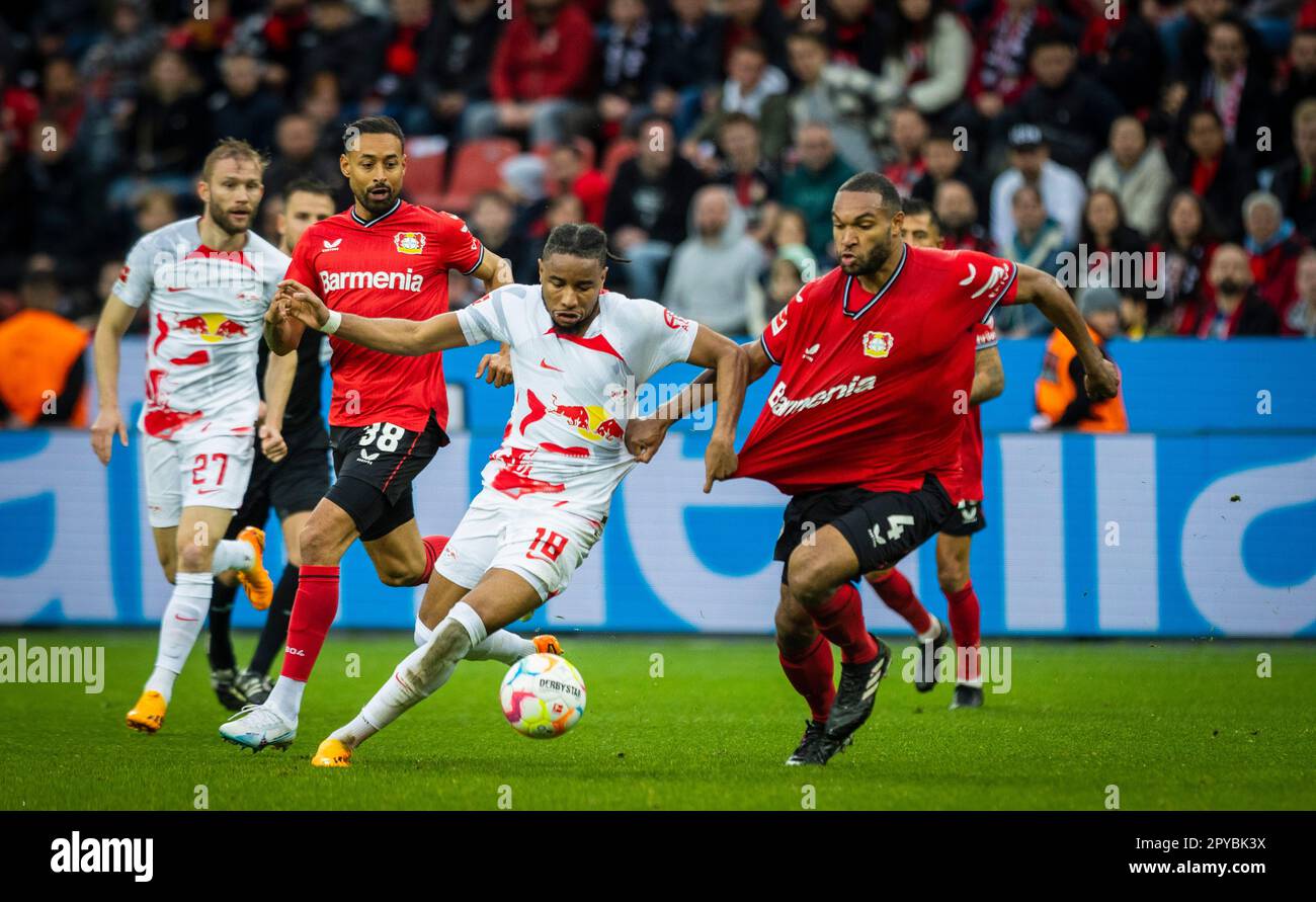 Leverkusen, Deutschland. 23. April 2023. Karim Bellarabi (Leverkusen), Christopher Nkunku (RBL), Jonathan Tah (Leverkusen) Bayer Leverkusen – RB Leipzig Stockfoto