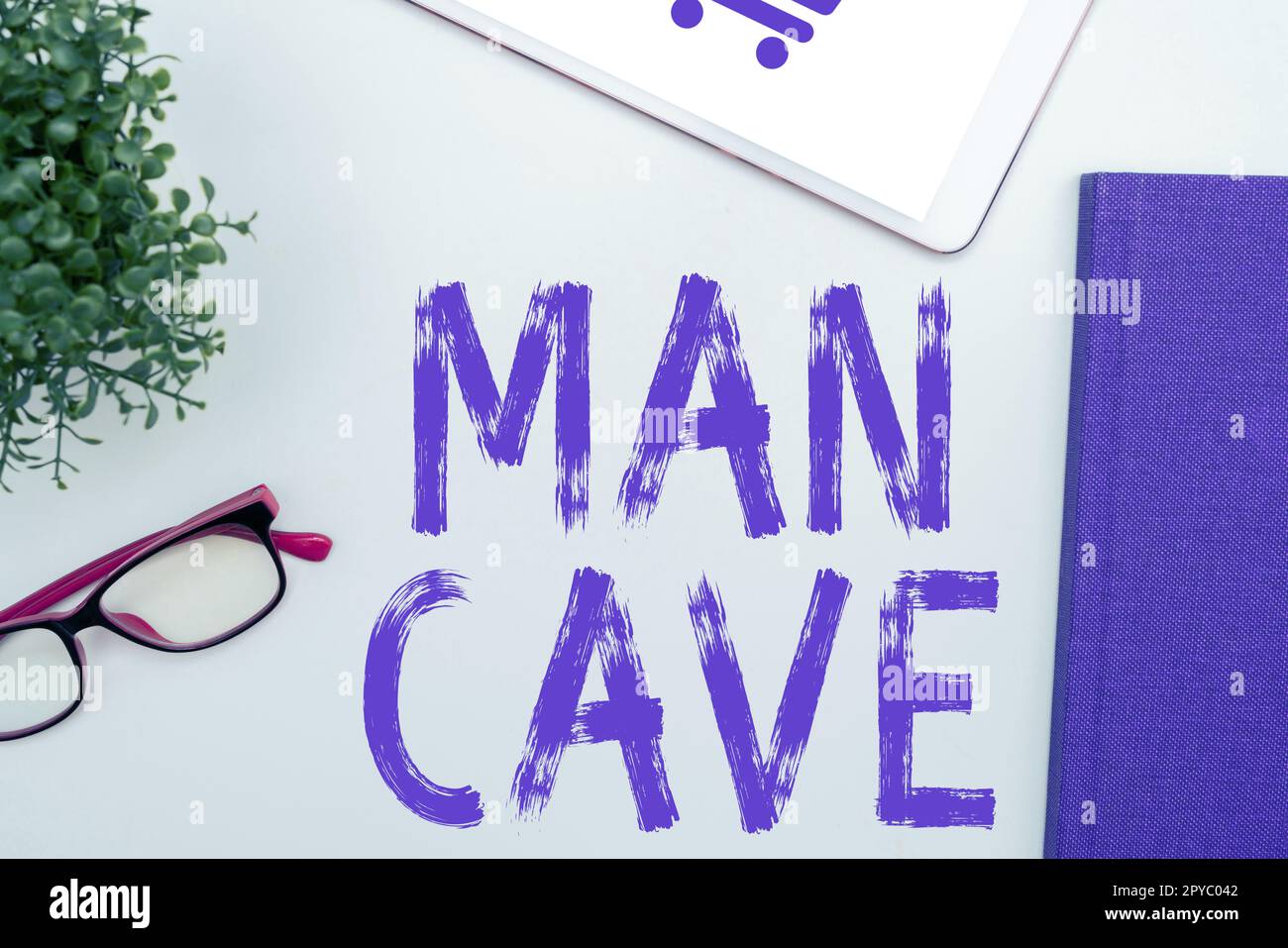Schrift mit dem Text man Cave. Geschäftsvorführung ein Raum, ein Bereich oder ein Bereich einer Wohnung, die für einen Mann reserviert ist Stockfoto