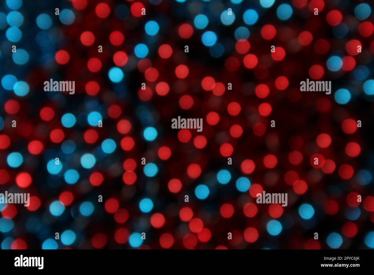 Blaue und rote abstrakte Bokeh-Unschärfe-Lichter Stockfoto