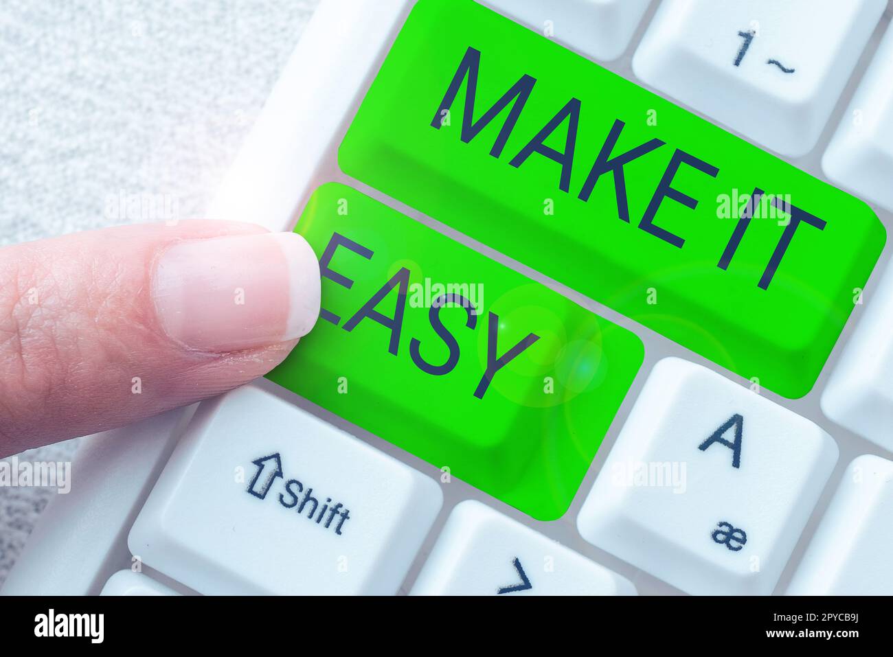 Textzeichen mit „Make IT Easy“. Geschäftskonzept intelligenter Ansatz mühelos frei von Sorgen oder Schwierigkeiten Stockfoto
