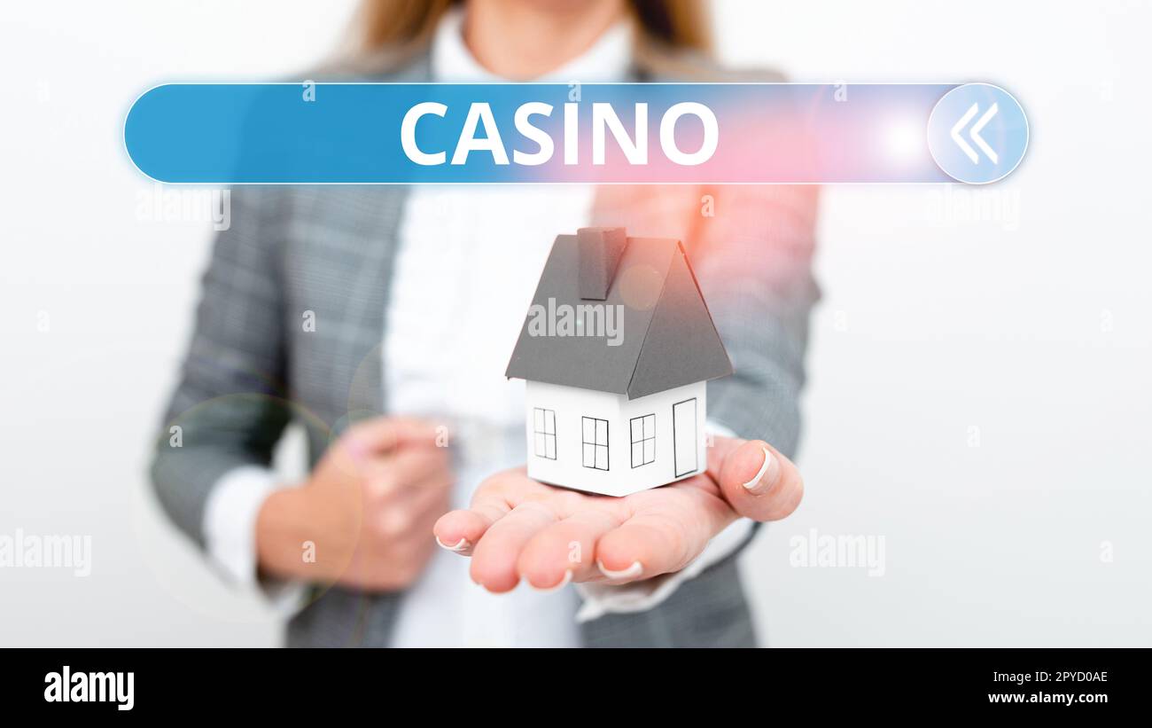Schild mit der Aufschrift „Casino“. Geschäftsidee ein Gebäude, in dem Spiele, insbesondere Roulette und Kartenspiele, gespielt werden Stockfoto Schild mit der Aufschrift „Casino“. Geschäftsidee ein Gebäude, in dem Spiele, insbesondere Roulette und Kartenspiele, gespielt werden Stockfoto
