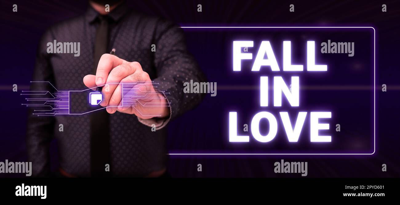 Handgeschriebenes Schild "Fall in Love". Geschäftsansatz von jemandem begeistert oder begeistert Stockfoto