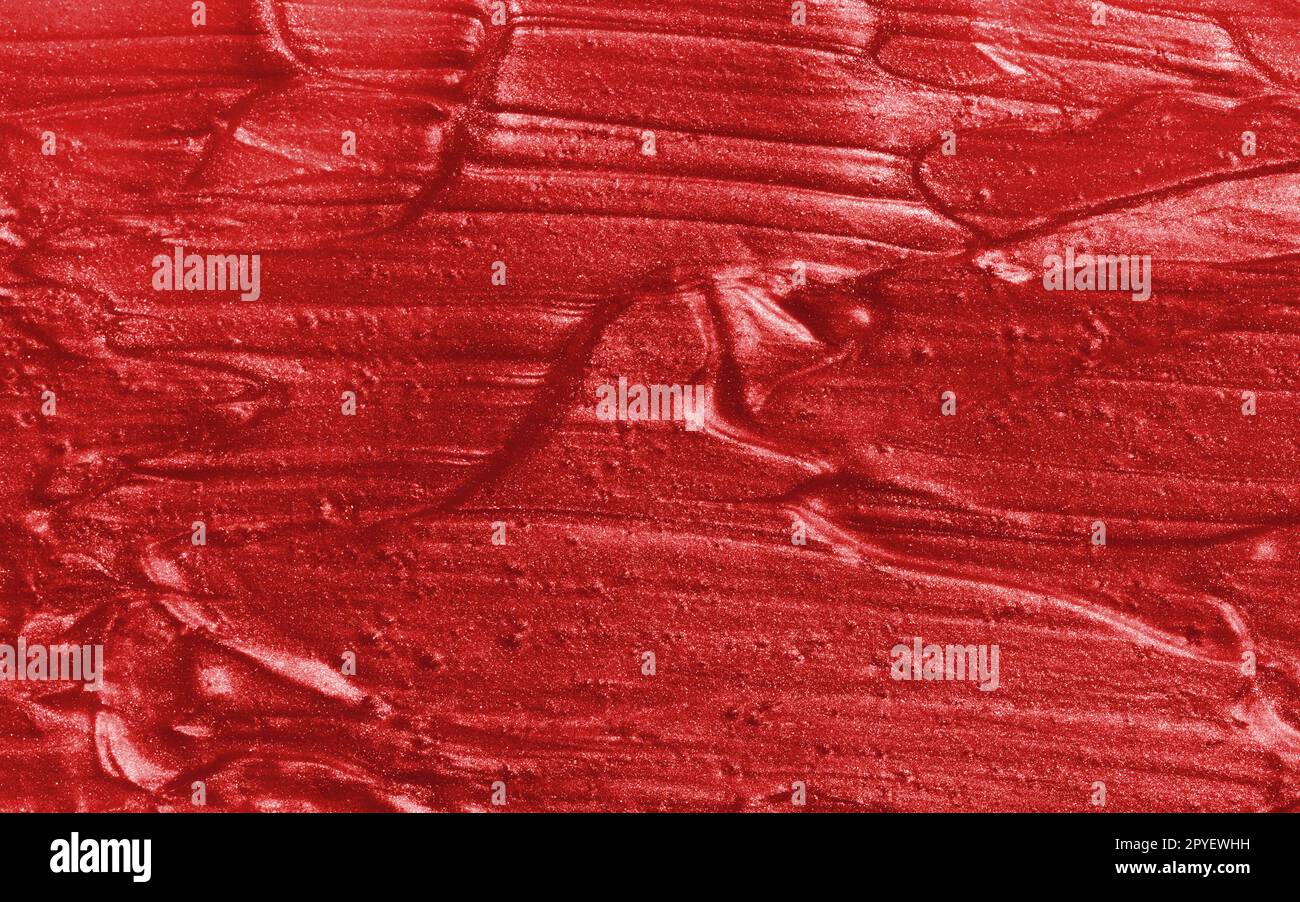 Probe von rotem Glitzergel mit kleinen Partikeln, Textur von Textmarkern, Lippenstift, Rouge Stockfoto