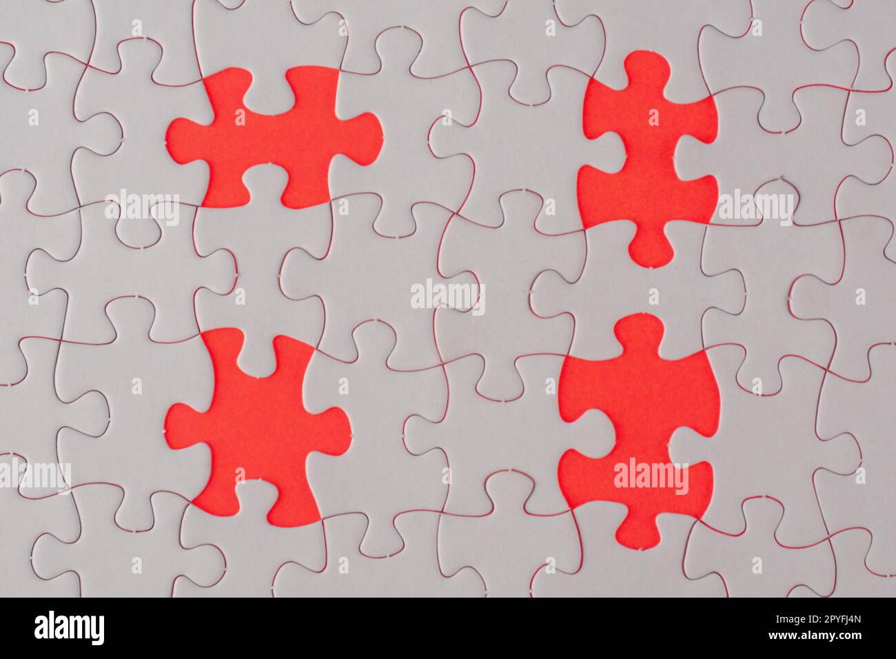 Fehlendes Puzzleteil aus weißem Puzzle Stockfoto