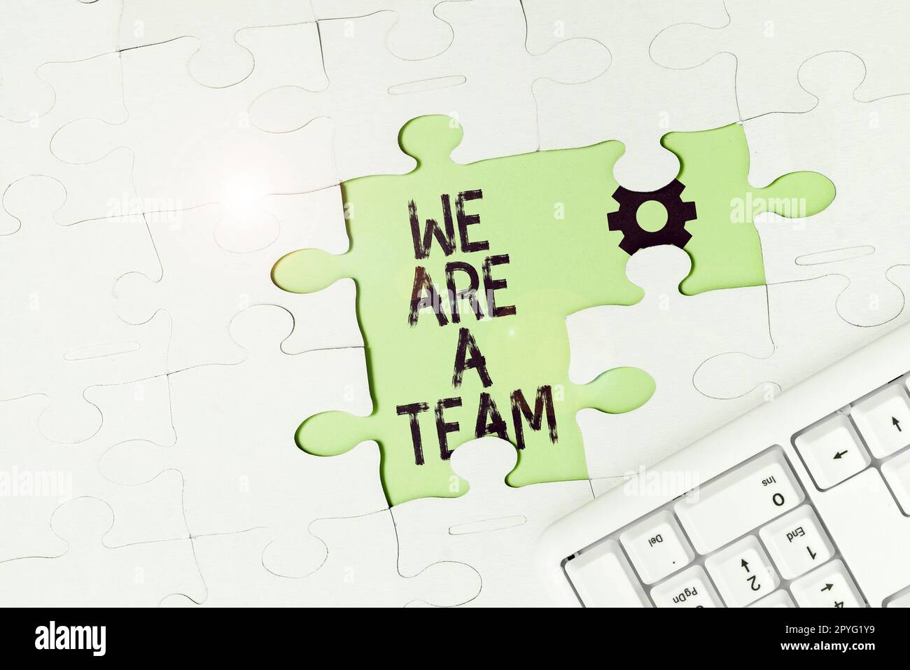 Konzeptionelle Darstellung Wir sind Ein Team. Wort für Zusammenarbeit, um eine gemeinsame Vision oder gemeinsame Ziele zu erreichen Stockfoto