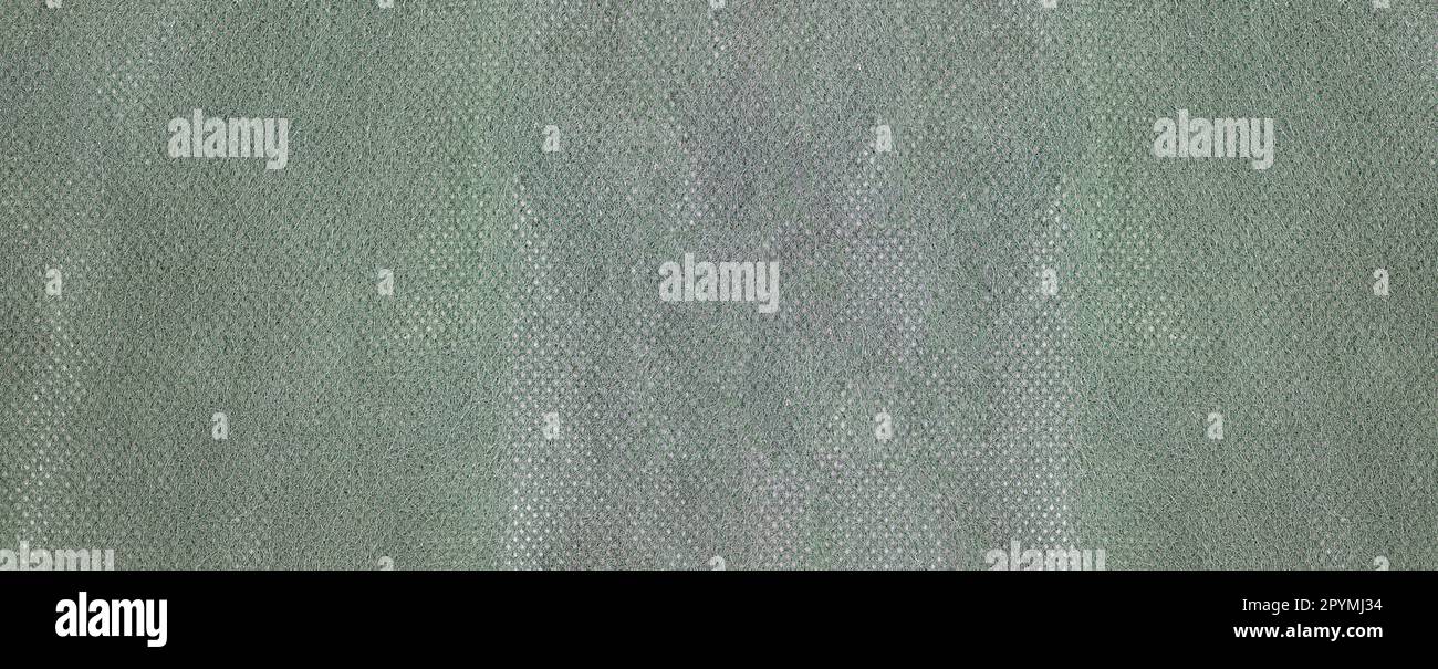 Breiter grüner Hintergrund aus Mikrofasertuch für Design in Ihrem Arbeitskonzept. Stockfoto